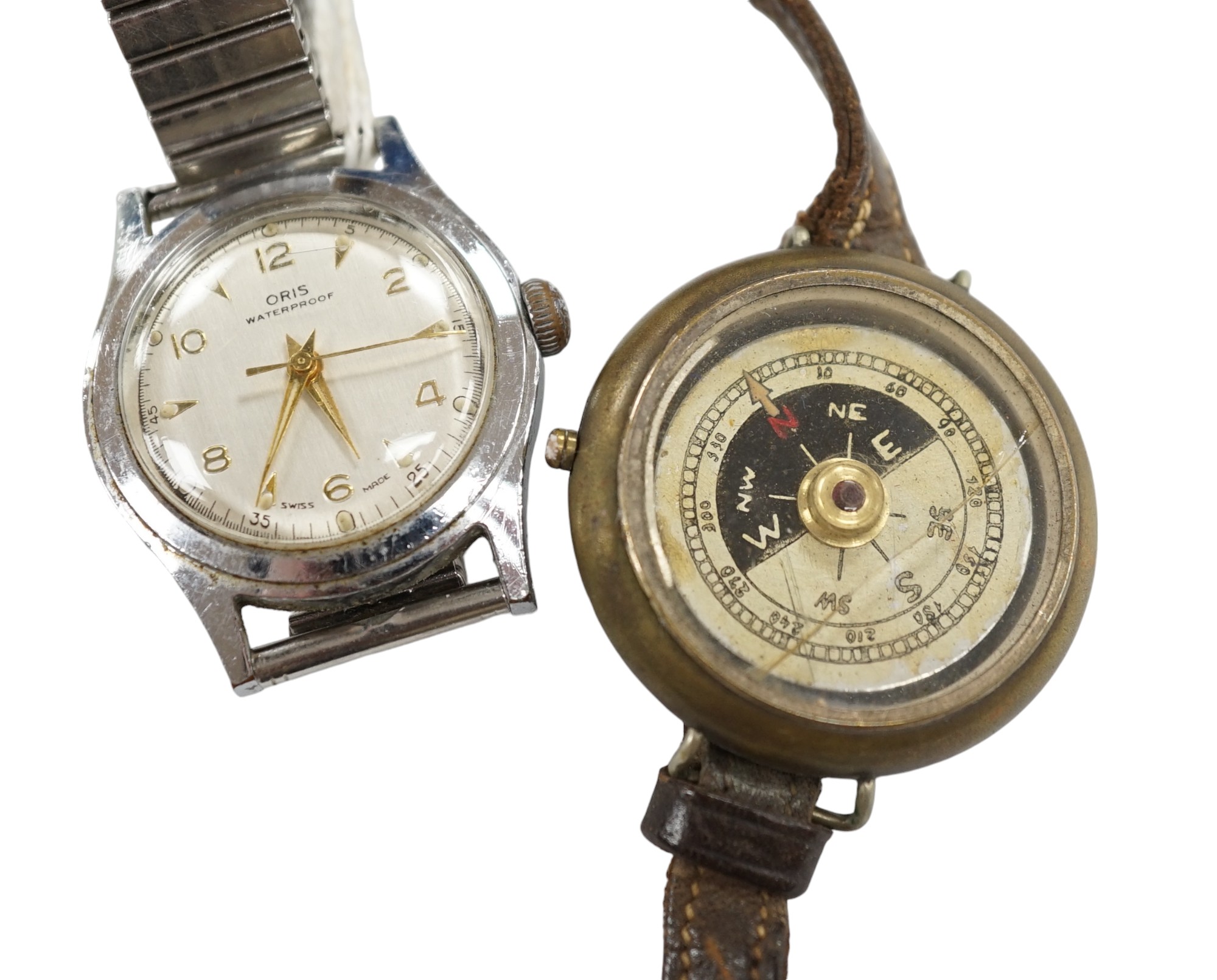 A gentleman's stainless steel Oris manual wind wrist watch and a base metal wrist compass. Condition - poor to fair